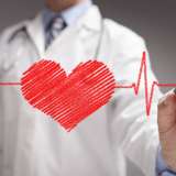 A doctor in a white lab coat draws a red heart with a heartbeat line through it.