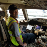 Herbert Williams in an airplane cockpit.