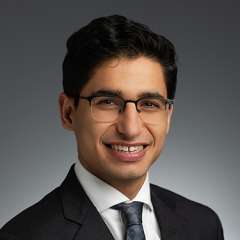 Head shot of Rafael Maarek, MD in a business suit, smiling at camera
