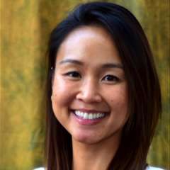 headshot of Dr. Kim Vu in front of brown backdrop