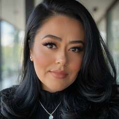 headshot of Slyvia Alamillo wearing a black turtleneck