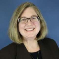 Headshot of Dr. Moran in black blazer