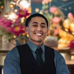 Headshot of Troy Thiratalerngkiat.