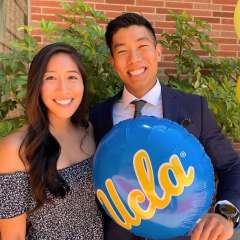 Dr. Albert Lee with his wife Victoria holding a UCLA balloon