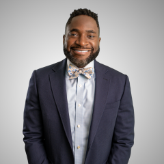 Profile photo of Dr. Essien smiling