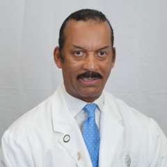 Headshot of Dr. Eleby Washington