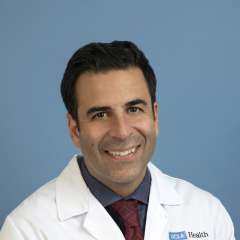 Jamil A. Aboulhosn, MD smiling portrait in white coat