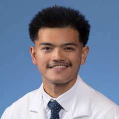 A headshot of Reant Mapue, MD