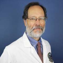 headshot of Dr. Goetz in white lab coat