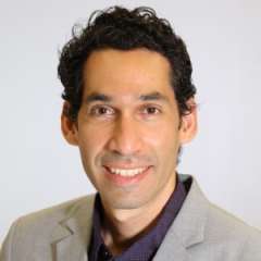 Head shot of Jesus Campagna smiling at the camera