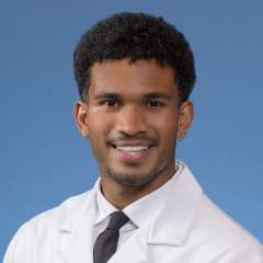 A headshot of Viliami Tillage, MD