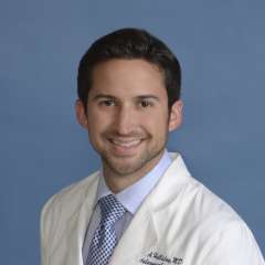 Michael A. Holliday, MD