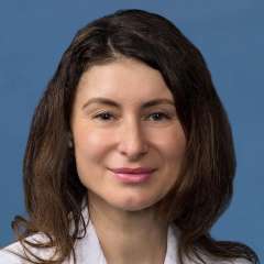 Ana V. Tchicaya, NP