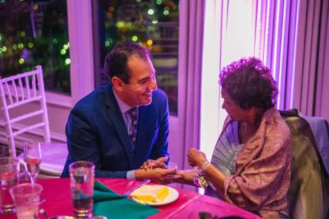 Teresa Rodrigues shares a tender moment with her UCLA Health cardiologist Dr. Tamer Sallam, during her birthday celebration. (Photo courtesy of Mitchell Maher)